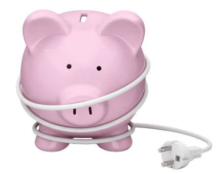 A pink piggy bank with an extension cord wrapped around it.